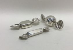 A group of three novelty silver sweets. 925 standa