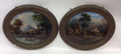 A pair of oval reverse painted glass pictures of C