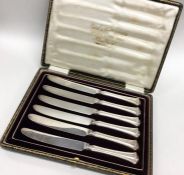 A boxed set of six silver handled tea knives. Shef