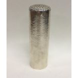 STUART DEVLIN: A rare cylindrical silver sugar cas