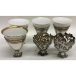 A set of four unusual Continental silver egg cups