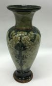 A massive Royal Doulton green ground vase of balus