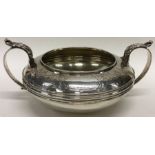 A good quality Victorian silver sugar bowl decorat