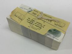 A bundle of 500 Bank of England £1 notes in numeri