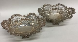 An attractive pair of heavy cast silver bonbon dis