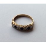 A sapphire and diamond 9 carat half eternity ring