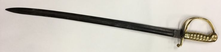A brass sword with steel blade and textured handle