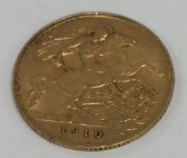 A 1910 half sovereign. Est. £70 - £80.