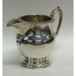 A good Edwardian cream jug on circular base. Appro