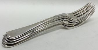 A set of four OE pattern silver dessert forks toge