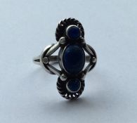 GEORG JENSEN: An unusual silver and lapis ring. Nu