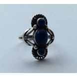 GEORG JENSEN: An unusual silver and lapis ring. Nu