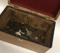 A box containing copper and silver coins. Est. £20