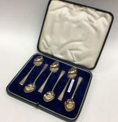 A boxed set of silver coffee spoons. Sheffield. Ap