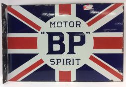 A rectangular "BP Motor Spirit" double-sided metal