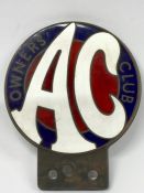 A metal and enamel "AC Owners' Club" car badge. (1