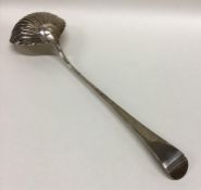 An early Georgian silver ladle with reeded bowl. L