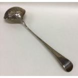 An early Georgian silver ladle with reeded bowl. L