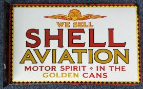 A rectangular "Shell Aviation Motor Spirit In The