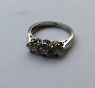 An Antique diamond three stone ring in traditional