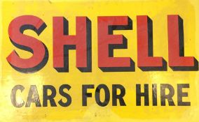 A rectangular "Shell Cars For Hire" double-sided m