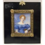 A rectangular miniature of a lady in blue dress wi