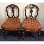 A pair of Gothic style upholstered dining chairs o