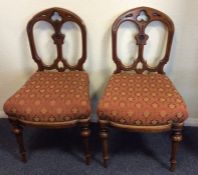 A pair of Gothic style upholstered dining chairs o