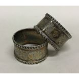 A pair of Victorian style silver napkin rings engr