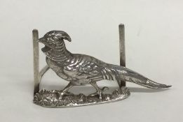 A good English silver menu holder in the form of a