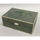 A rectangular shagreen and ivory box with hinged t