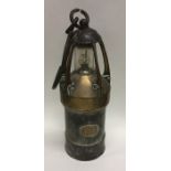 An unusual Antique brass mounted miner's lamp. App