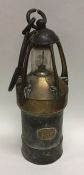 An unusual Antique brass mounted miner's lamp. App