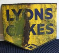 A kite shaped "Lyons Cakes" double-sided metal and