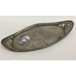 A Georgian silver oval letter tray with bright cut