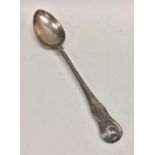 A large silver hourglass pattern basting spoon. Lo