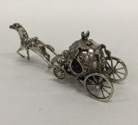 An unusual miniature horse and cart. 925 standard.