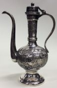 An Egyptian silver slender coffee pot attractively