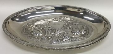 A good pair of heavy silver oval dishes decorated