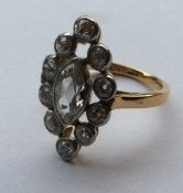 A large stylish marquise diamond cluster ring in t