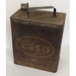 An "Esso" fuel can. (1).