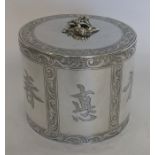 An unusual Georgian silver cylindrical tea caddy a