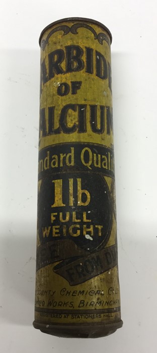 A "Carbide of Calcium 1lb Full Weight" can. (1).