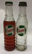 Two "Castrol Oil" bottles.