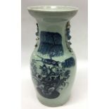 A tall blue ground Chinese vase decorated with bir