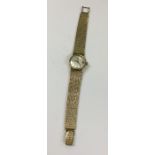 A lady's 9 carat Omega wristwatch on mesh strap. A