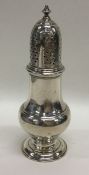 A good Georgian baluster shaped silver caster of t