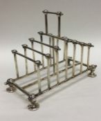 An EPNS toast rack in Christopher Dresser design.