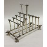 An EPNS toast rack in Christopher Dresser design.