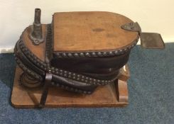 A pair of unusual leather and oak mounted bellows